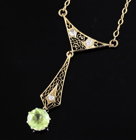 A pierced gold, diamond and peridot set drop pendant necklace,
